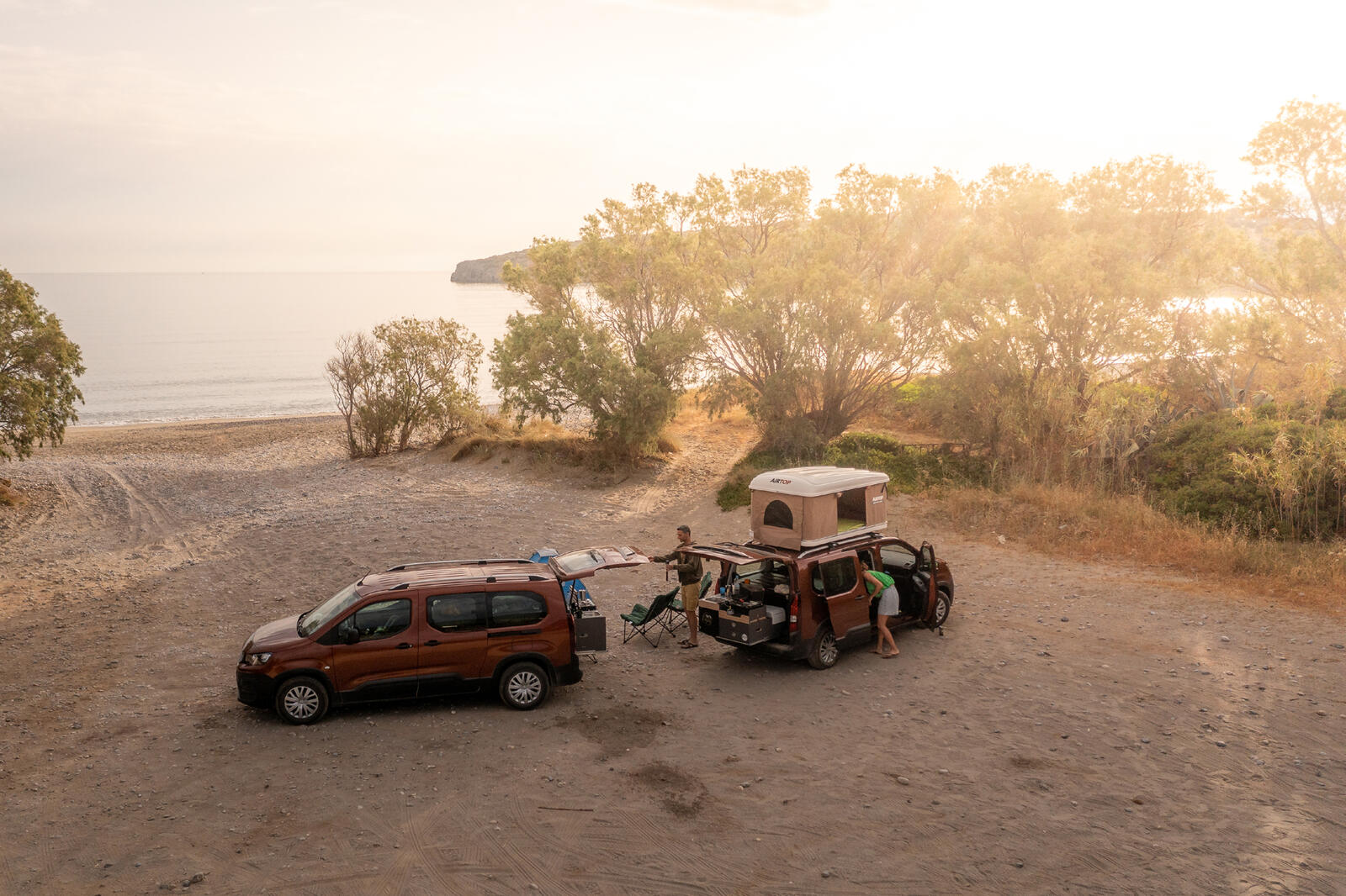 Two WanderVans at sunset beach